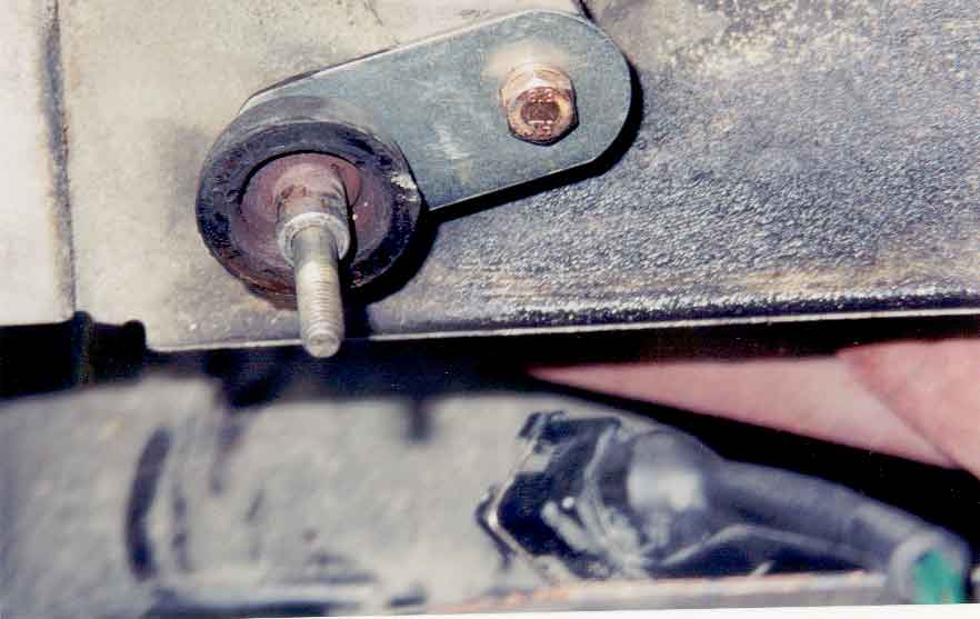 The fix is a small metal plate positioned so the stud fits the aluminium plenum. Use two nuts to secure the stud to the plate.  Locktite is recommended so removal of the plenum is easy